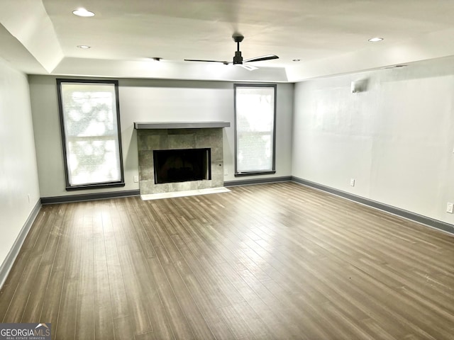 3810 Galloway Dr NE, Roswell, GA 30075 - unfurnished living room featuring ceiling fan, wood finished floors, a fireplace, baseboards, and recessed lighting