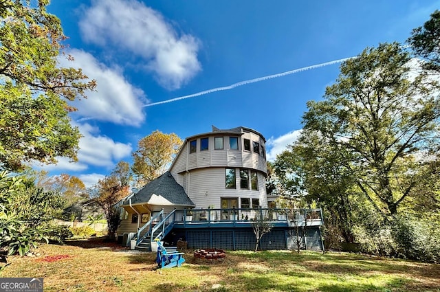 3810 Galloway Dr NE, Roswell, GA 30075 - back of property with a deck, a yard, stairs, and a fire pit