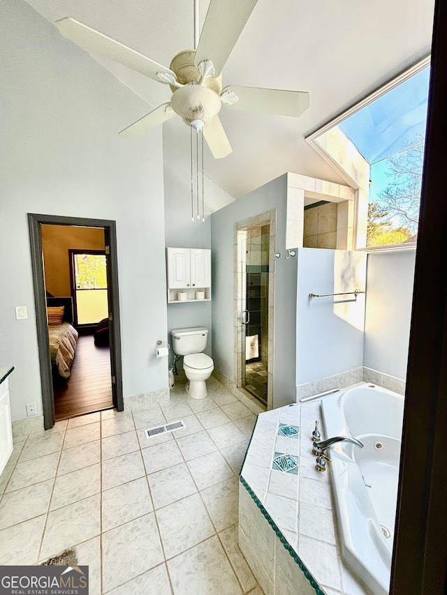3810 Galloway Dr NE, Roswell, GA 30075 - full bath featuring a stall shower, toilet, a ceiling fan, tile patterned floors, and a jetted tub