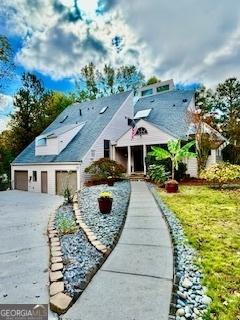 3810 Galloway Dr NE, Roswell, GA 30075 - view of front of house featuring concrete driveway, a front lawn, and a garage