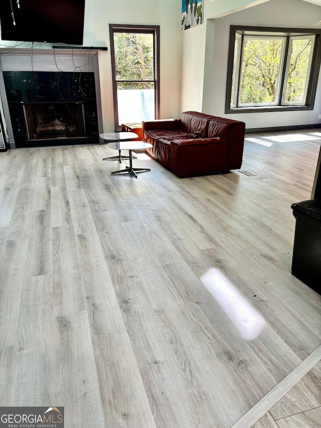 3810 Galloway Dr NE, Roswell, GA 30075 - living room with wood finished floors, plenty of natural light, and a high end fireplace
