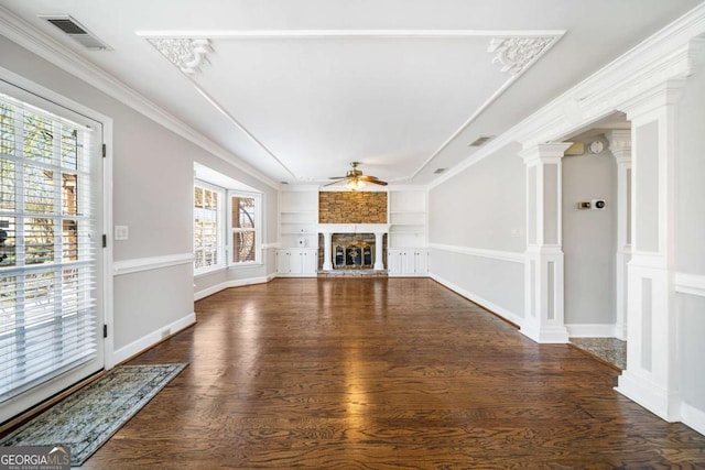 931 New Bedford Dr, Marietta, GA 30068 - unfurnished living room with visible vents, built in shelves, ceiling fan, ornamental molding, and dark wood-style flooring