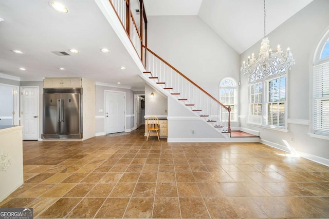 931 New Bedford Dr, Marietta, GA 30068 - tiled foyer entrance with baseboards, an inviting chandelier, recessed lighting, stairs, and crown molding