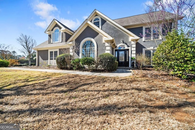 931 New Bedford Dr, Marietta, GA 30068 - view of front of house with stucco siding and a front lawn