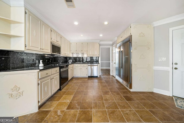 931 New Bedford Dr, Marietta, GA 30068 - kitchen with dark countertops, visible vents, decorative backsplash, appliances with stainless steel finishes, and open shelves