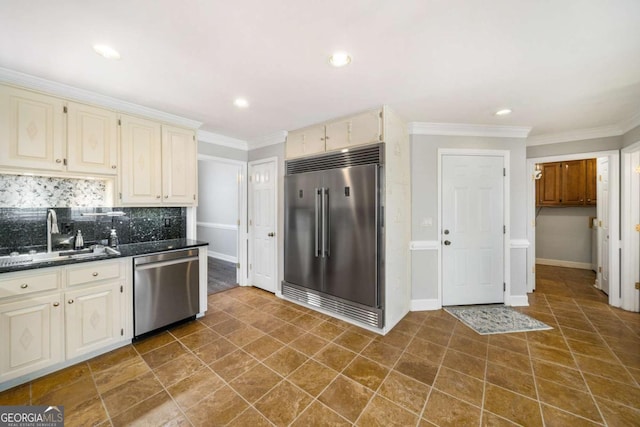 931 New Bedford Dr, Marietta, GA 30068 - kitchen with cream cabinetry, appliances with stainless steel finishes, and a sink