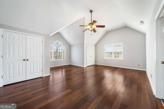 931 New Bedford Dr, Marietta, GA 30068 - additional living space with dark wood finished floors, vaulted ceiling, a ceiling fan, and baseboards