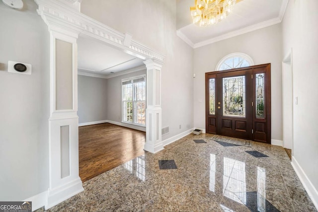 931 New Bedford Dr, Marietta, GA 30068 - entrance foyer with granite finish floor, crown molding, and baseboards