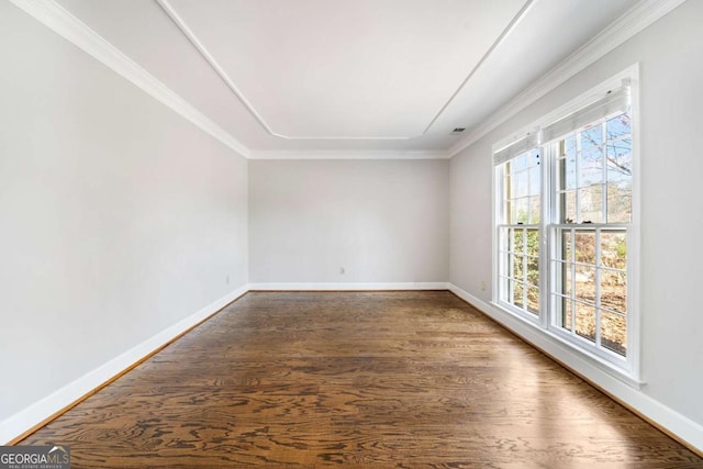 931 New Bedford Dr, Marietta, GA 30068 - spare room with visible vents, ornamental molding, baseboards, and wood finished floors