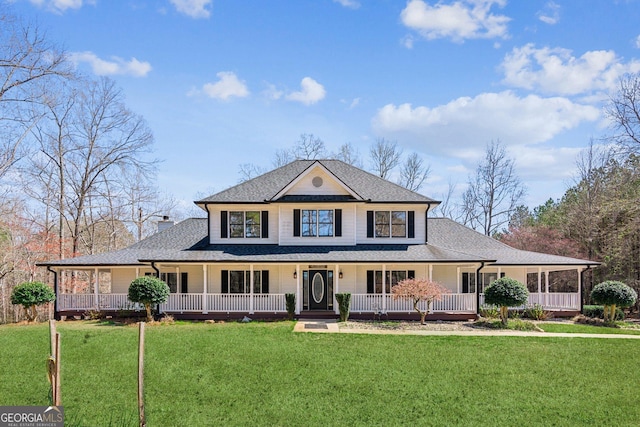 11637 Brown Bridge Rd, Covington, GA 30016 - country-style home featuring covered porch, a front lawn, and a shingled roof