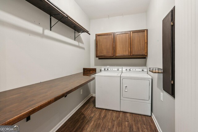 11637 Brown Bridge Rd, Covington, GA 30016 - laundry room with dark wood-type flooring, cabinet space, and independent washer and dryer