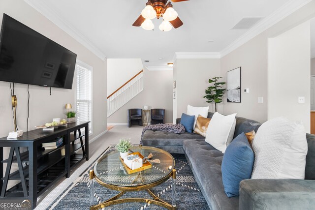 3660 Lake Pass Ln, Suwanee, GA 30024 - living area featuring stairway, a ceiling fan, crown molding, and light colored carpet