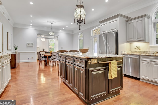 1575 Oak Mountain Rd, Shiloh, GA 31826 - kitchen with appliances with stainless steel finishes, light wood-style floors, recessed lighting, decorative light fixtures, and a chandelier