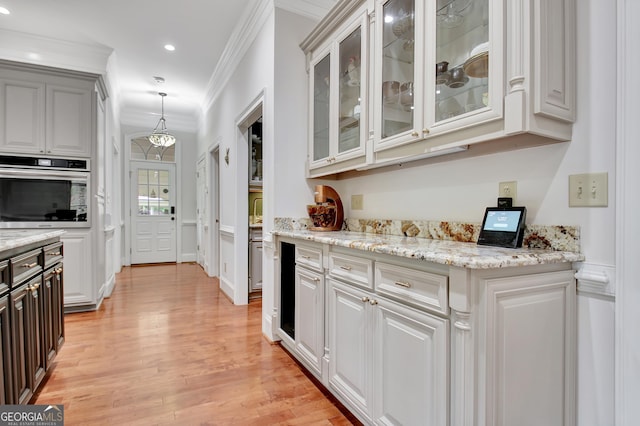 1575 Oak Mountain Rd, Shiloh, GA 31826 - kitchen featuring stainless steel oven, ornamental molding, light wood-style flooring, glass insert cabinets, and recessed lighting