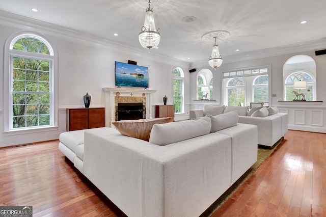 1575 Oak Mountain Rd, Shiloh, GA 31826 - living area featuring plenty of natural light, a fireplace, visible vents, and hardwood / wood-style flooring