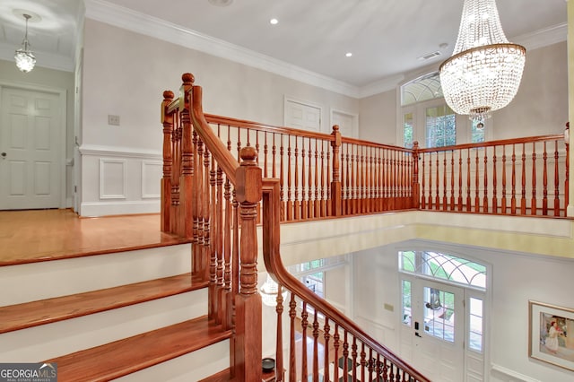 1575 Oak Mountain Rd, Shiloh, GA 31826 - staircase featuring an inviting chandelier, ornamental molding, and visible vents