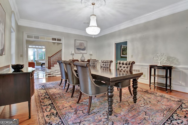 1575 Oak Mountain Rd, Shiloh, GA 31826 - dining area featuring crown molding, wainscoting, and light wood finished floors