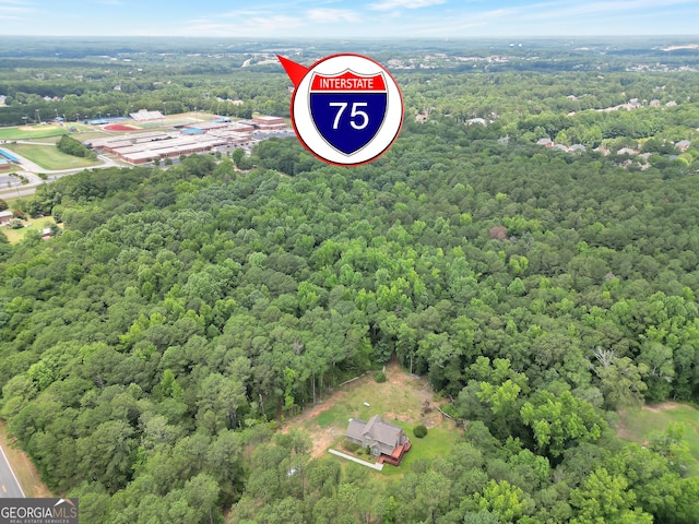 bird's eye view with a view of trees