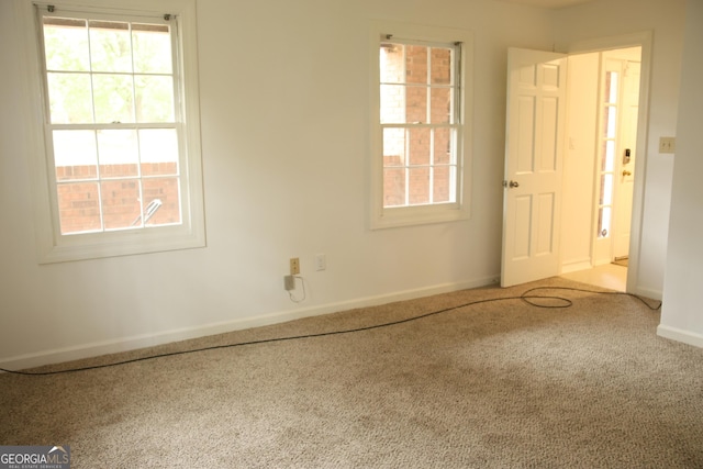 3348 Summit Turf Ln, Snellville, GA 30078 - carpeted empty room featuring baseboards and a healthy amount of sunlight