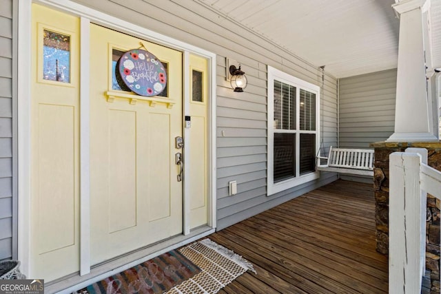 property entrance with a porch