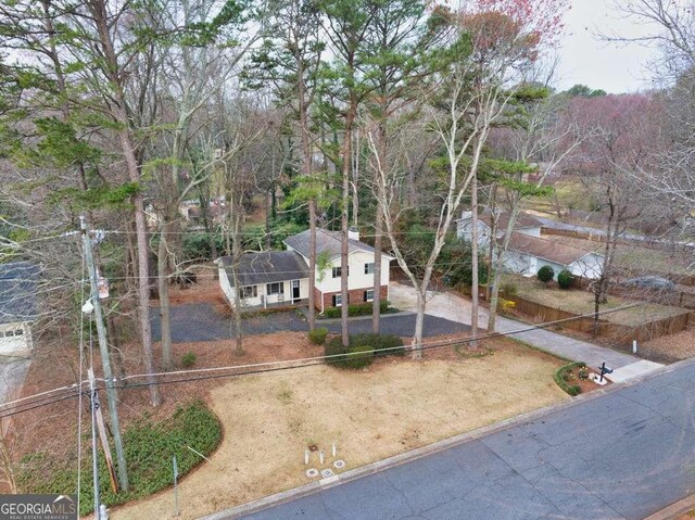 1417 Hickory Dr SW, Lilburn, GA 30047 - view of front facade featuring asphalt driveway