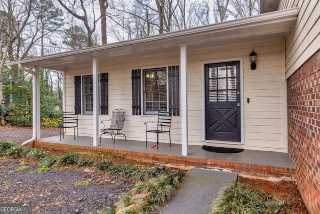 1417 Hickory Dr SW, Lilburn, GA 30047 - property entrance with a porch