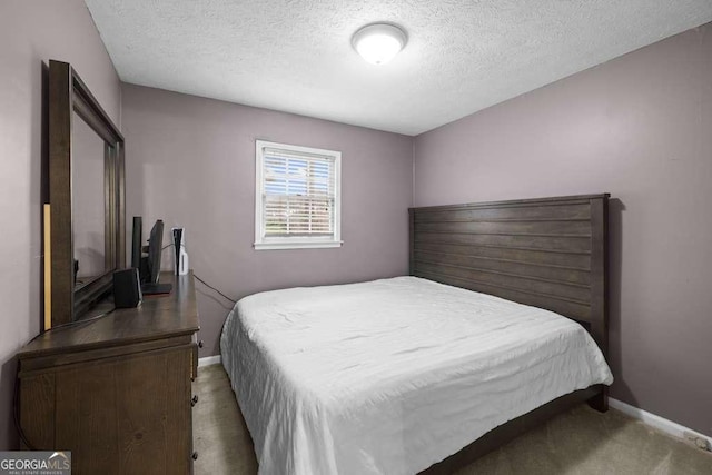 1417 Hickory Dr SW, Lilburn, GA 30047 - bedroom featuring carpet flooring and a textured ceiling