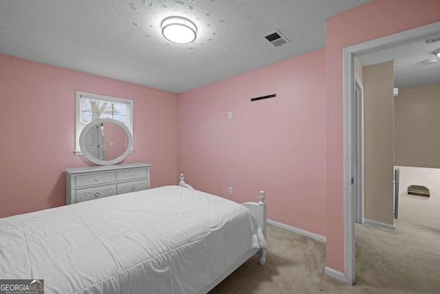 1417 Hickory Dr SW, Lilburn, GA 30047 - bedroom featuring carpet flooring and a textured ceiling