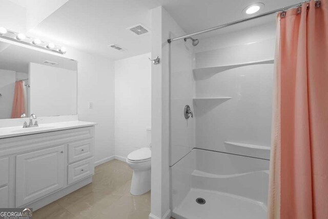 1417 Hickory Dr SW, Lilburn, GA 30047 - bathroom featuring vanity and curtained shower