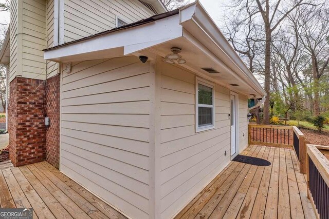 1417 Hickory Dr SW, Lilburn, GA 30047 - view of wooden terrace