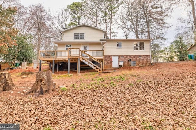 1417 Hickory Dr SW, Lilburn, GA 30047 - back of house featuring stairs and a deck