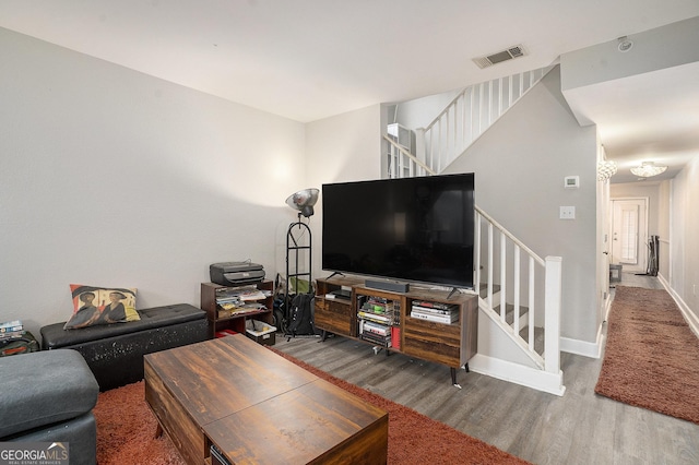 385 Ralph Mcgill Blvd NE Unit D, Atlanta, GA 30312 - living room featuring wood finished floors, stairs, and baseboards