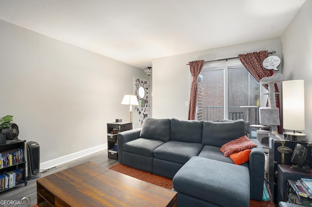 385 Ralph Mcgill Blvd NE Unit D, Atlanta, GA 30312 - living room featuring wood finished floors and baseboards
