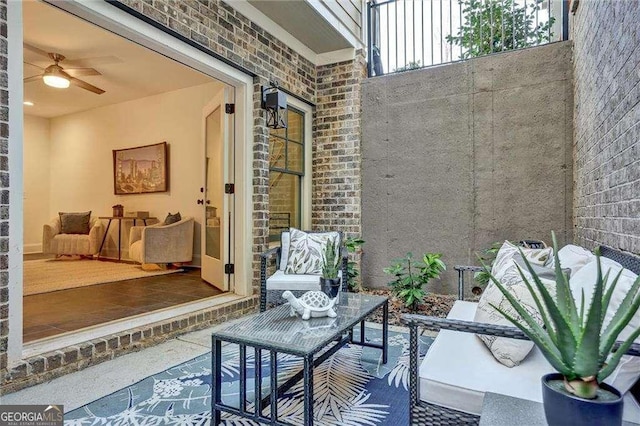 view of patio featuring a ceiling fan