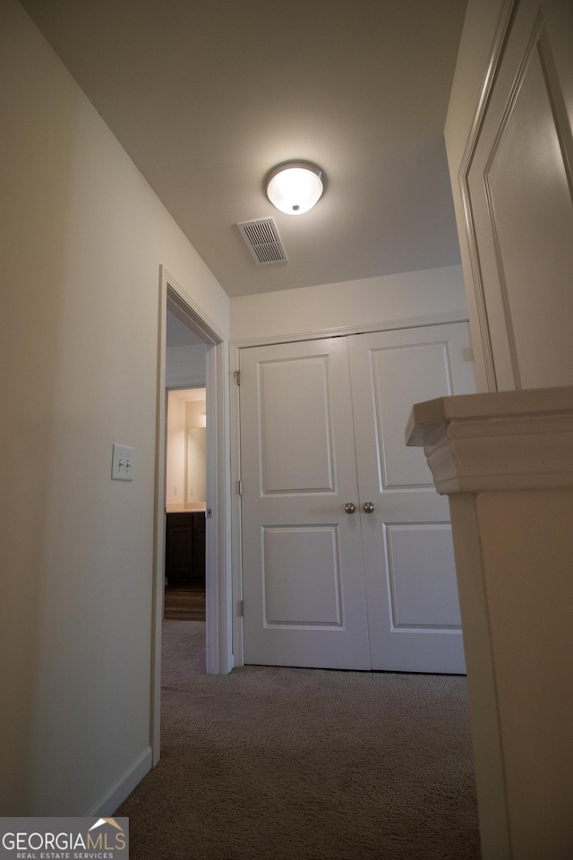 6342 Kinsland Ct, Lithonia, GA 30058 - corridor with visible vents, baseboards, and carpet floors