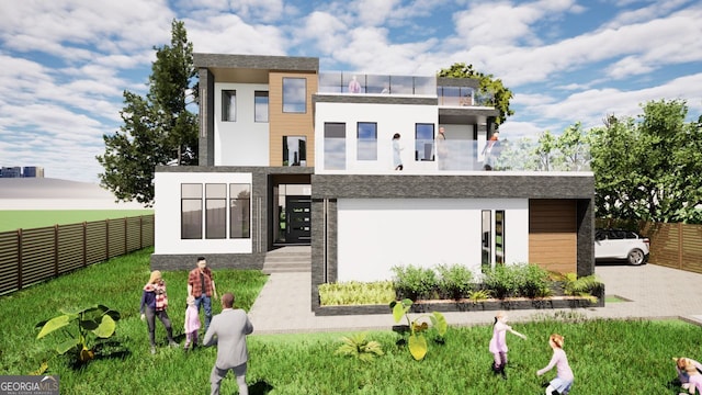 3534 Rockhaven, Atlanta, GA 30324 - modern home featuring driveway, stucco siding, and fence