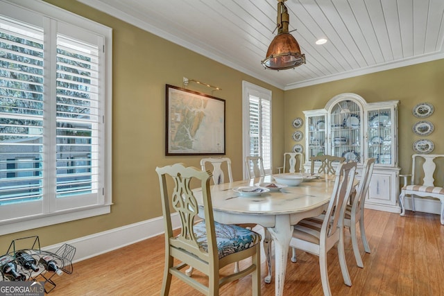 1108 E Mission Ln SE, Darien, GA 31305 - dining area featuring ornamental molding, wood finished floors, wooden ceiling, and baseboards
