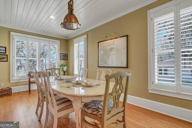 1108 E Mission Ln SE, Darien, GA 31305 - dining room featuring crown molding, baseboards, light wood-style floors, and wood ceiling