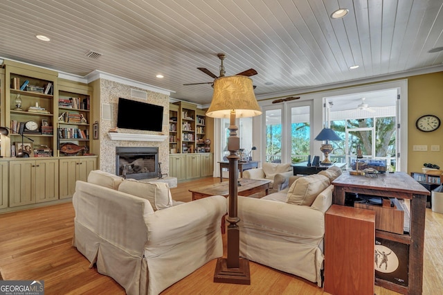 1108 E Mission Ln SE, Darien, GA 31305 - living area with a ceiling fan, ornamental molding, a stone fireplace, light wood finished floors, and wooden ceiling