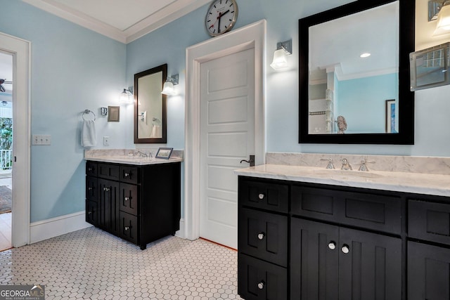 1108 E Mission Ln SE, Darien, GA 31305 - bathroom featuring ornamental molding, two vanities, and baseboards