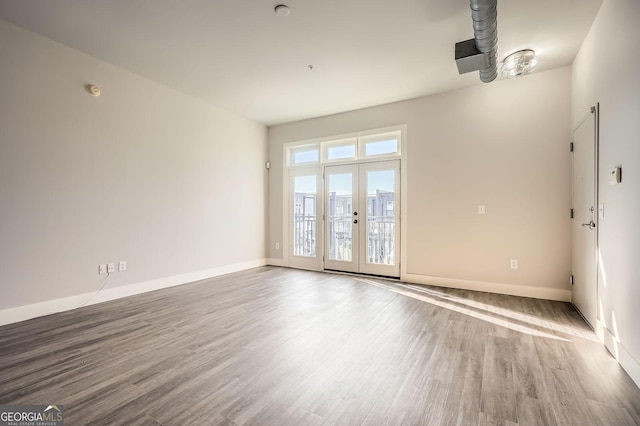 502 Pryor St SW Unit 301, Atlanta, GA 30312 - unfurnished room with wood finished floors and french doors