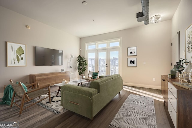 living room with french doors, baseboards, and dark wood-style flooring