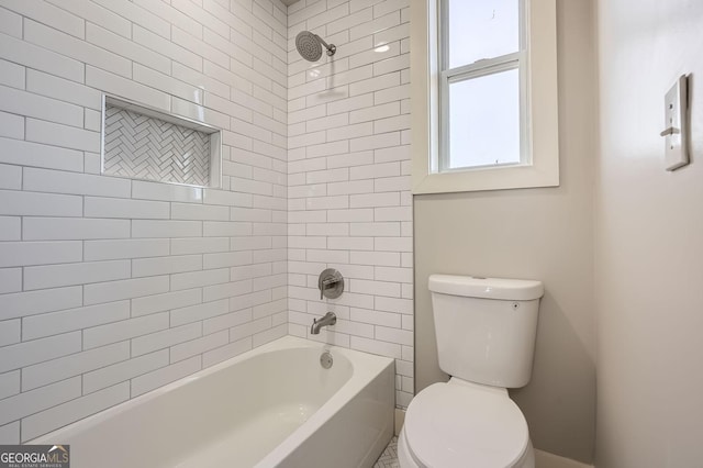 bathroom featuring toilet and shower / washtub combination