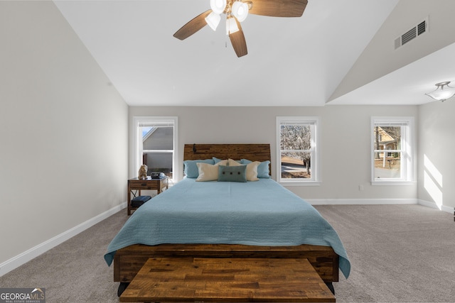 236 Village Park Dr, Newnan, GA 30265 - bedroom with carpet, baseboards, vaulted ceiling, multiple windows, and ceiling fan