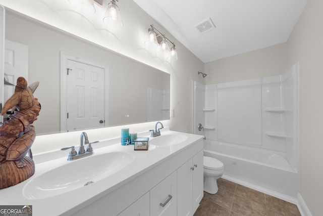 236 Village Park Dr, Newnan, GA 30265 - bathroom featuring double vanity, toilet, bathtub / shower combination, and tile patterned floors
