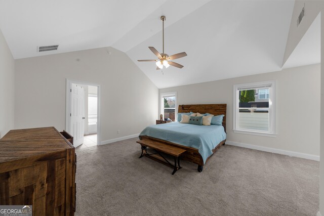 236 Village Park Dr, Newnan, GA 30265 - bedroom with vaulted ceiling, light carpet, baseboards, and a ceiling fan