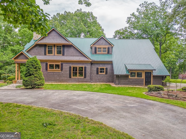 371 Stallion Dr, Summerville, GA 30747 - view of front of house featuring a chimney, metal roof, a front lawn, and concrete driveway
