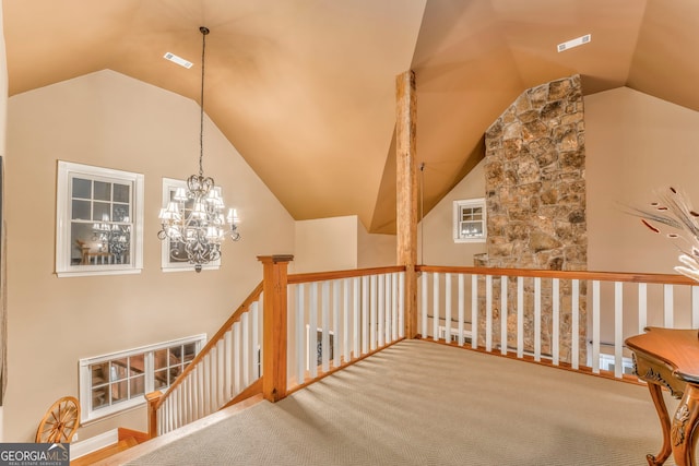 371 Stallion Dr, Summerville, GA 30747 - hall with vaulted ceiling, an upstairs landing, a chandelier, and carpet flooring