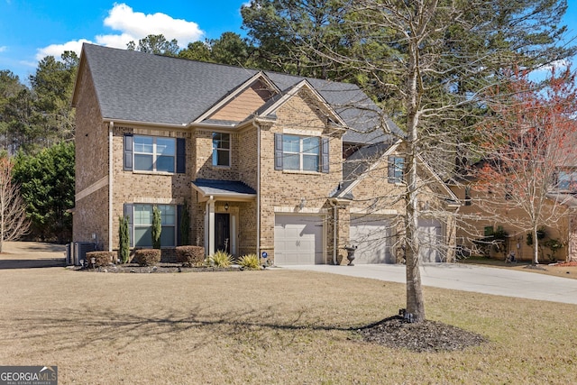 2441 Noelle Ln, Powder Springs, GA 30127 - view of front of property featuring a front yard, driveway, an attached garage, central AC, and brick siding