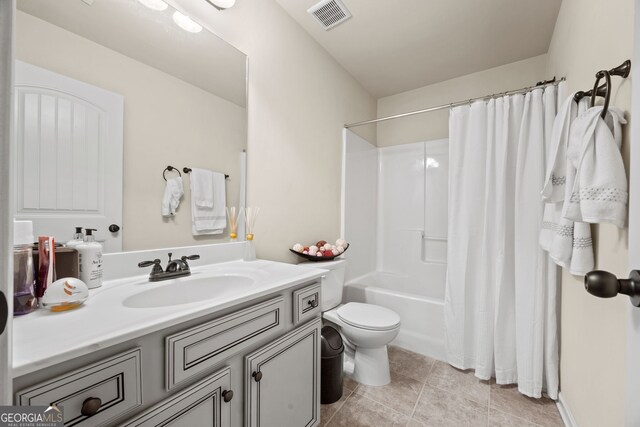 2441 Noelle Ln, Powder Springs, GA 30127 - bathroom featuring visible vents, toilet, shower / bath combo, tile patterned flooring, and vanity